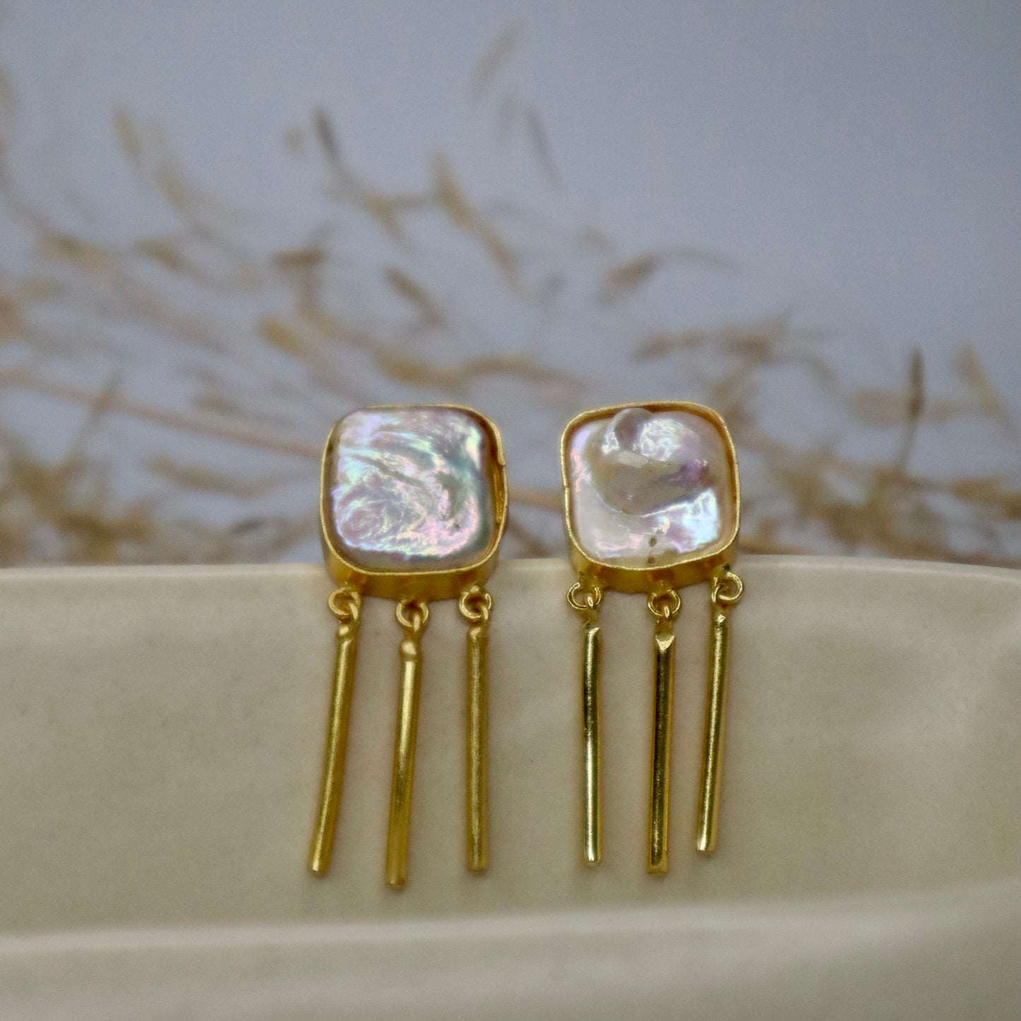 White Stone Golden Statement Earrings