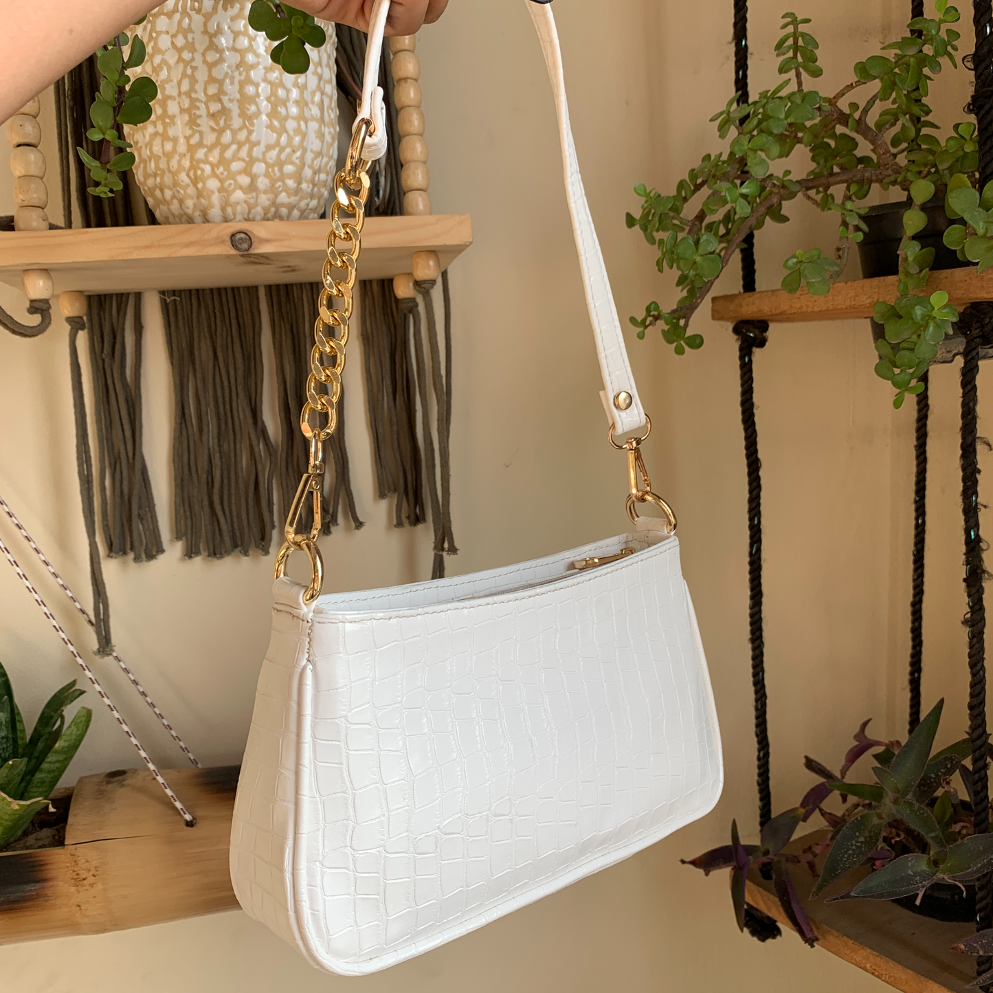 Baguette bag with chain outlet